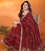 Silk blend maroon embroidered saree with blouse piece
