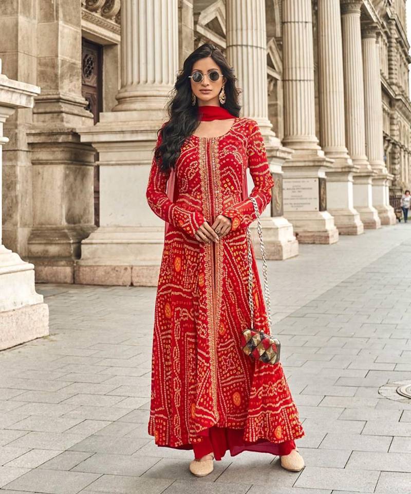 Red faux georgette printed embroidered salwar suit (free size)