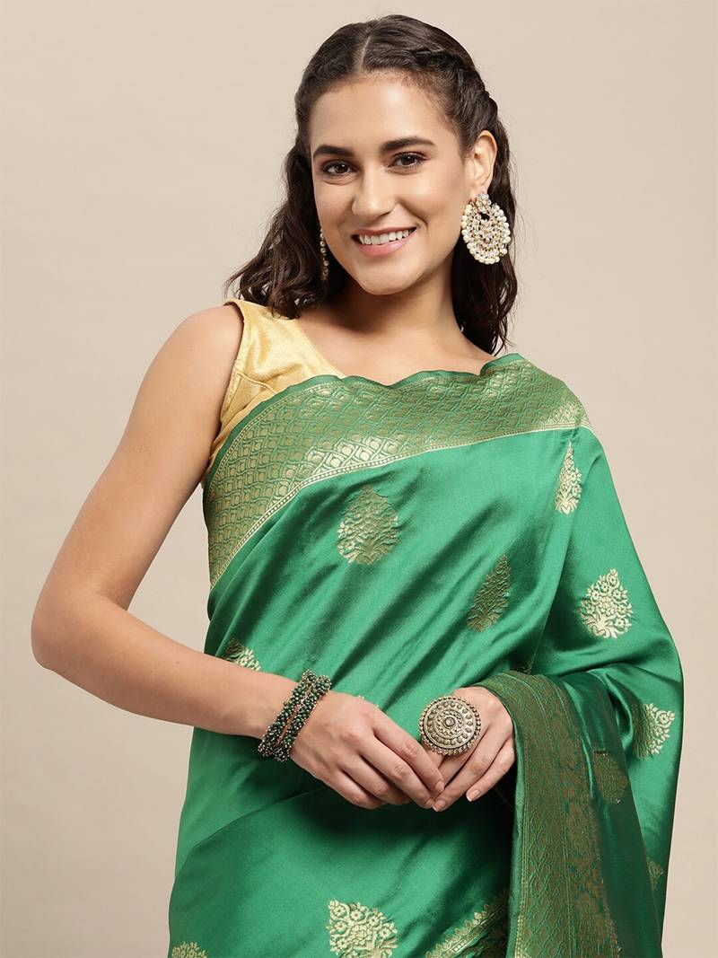 Dark green silk blend jacquard woven golden zari ethnic motifs rich pallu banarasi style saree