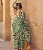 Tissue printed sea green saree