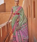 Sea green cotton silk blend patola print saree