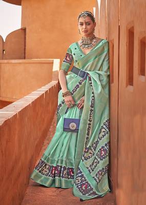 Sea green cotton silk blend patola print saree 1