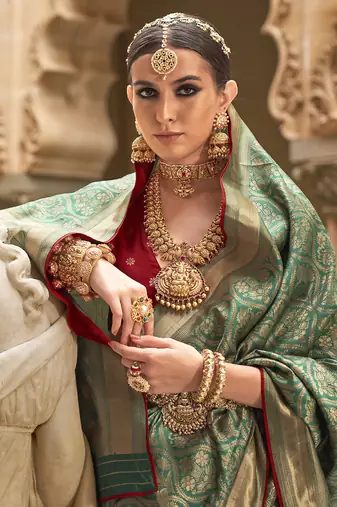 Banarasi silk blend jacquard work saree in green