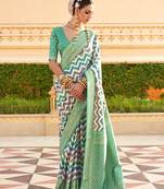 Silk blend turquoise foil print ceremonial saree