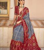 Grey & maroon silk blend foil print saree