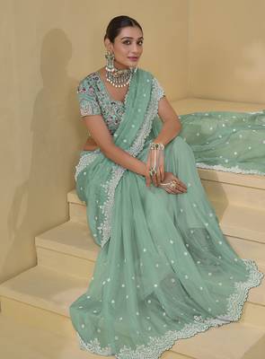 Turquoise organza silk blend sequins work saree 3