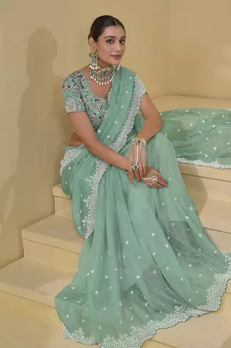 Turquoise organza silk blend sequins work saree