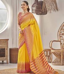 yellow banarasi soft silk blend woven saree with heavy jacquard work and blouse piece