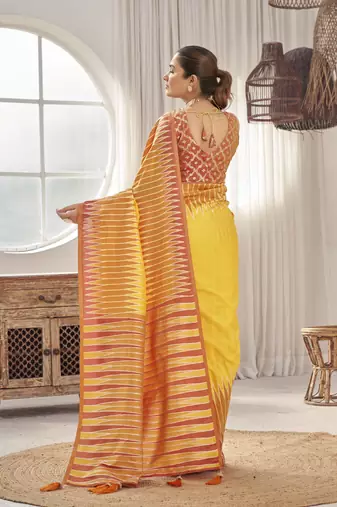 yellow banarasi soft silk blend woven saree with heavy jacquard work and blouse piece