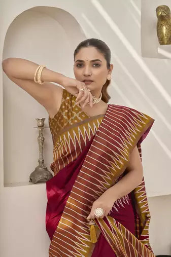 maroon banarasi soft silk blend woven saree with heavy jacquard work and blouse piece