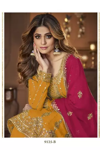 Yellow  heavy georgette indowestern wedding kurti & skirt set