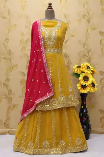 Yellow  heavy georgette indowestern wedding kurti & skirt set