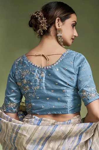 Earthy striped crushed tissue saree