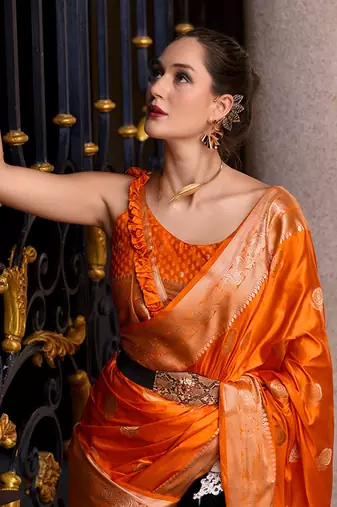 Radiant yellow banarasi silk saree with rose motifs & golden zari work