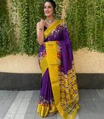 Vibrant purple and yellow patola printed saree