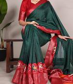 Green & red patola-inspired art silk saree with traditional motifs