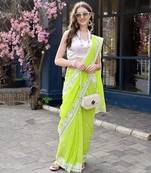 Lime green georgette embroidered saree