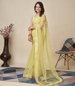 Yellow soft net saree with checks embroidery