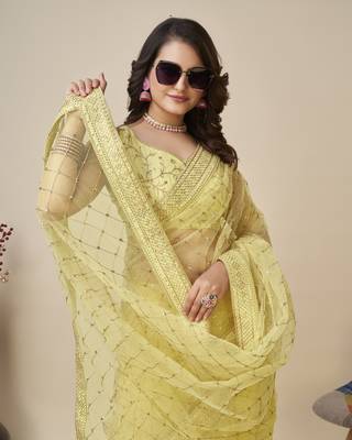 Yellow soft net saree with checks embroidery 3