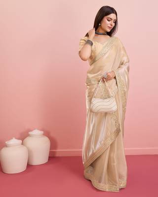 Soft tissue golden embroidered saree 2