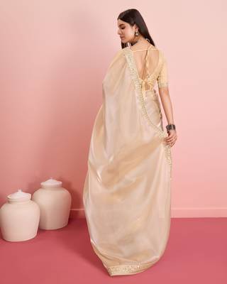 Soft tissue golden embroidered saree 3