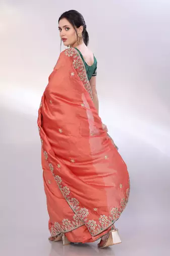 Rust orange art silk saree with embroidered border