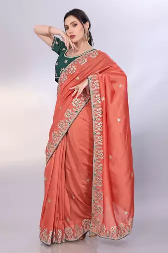 Rust orange art silk saree with embroidered border