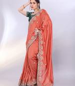 Rust orange art silk saree with embroidered border