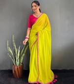 Neon yellow georgette saree with pink border