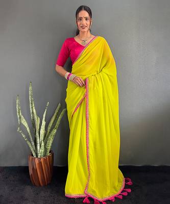 Neon yellow georgette saree with pink border 2