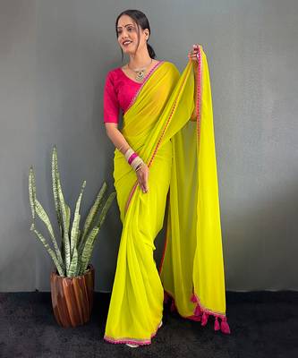Neon yellow georgette saree with pink border 3