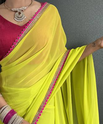 Neon yellow georgette saree with pink border 5