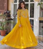 Yellow georgette embroidered flared gown with dupatta