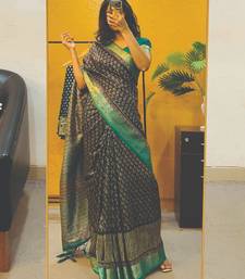 Floral print cotton silk saree with green border