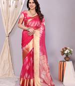 Pink woven banarasi organza saree with blouse