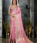 pink organza zari woven saree with unstitched blouse piece