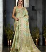 pista organza zari woven saree with unstitched blouse piece