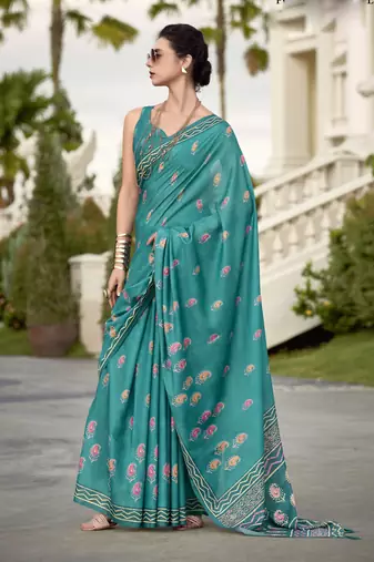 Women's turquoise silk blend printed saree with unstitched blouse piece