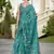 Women's turquoise silk blend printed saree with unstitched blouse piece