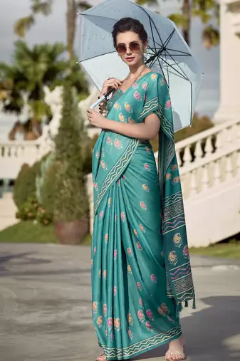 Women's turquoise silk blend printed saree with unstitched blouse piece