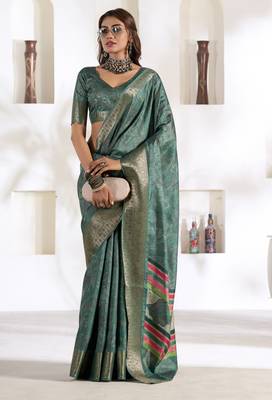 teal silk blend woven saree with unstitched blouse piece 1