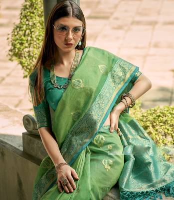parrot green tissue silk blend woven saree with unstitched blouse piece 3