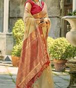 cream tissue silk woven saree with unstitched blouse piece