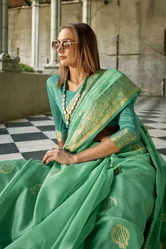 turquoise tissue silk woven saree with unstitched blouse piece