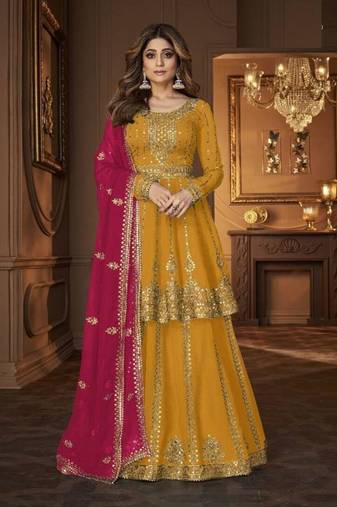 Yellow  heavy georgette indowestern wedding kurti & skirt set