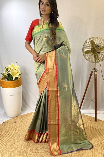 Green art Silk Blend saree with zari embroidery