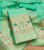 Sea green floral woven banarasi silk dress material