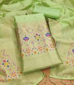 Pista floral woven banarasi silk dress material