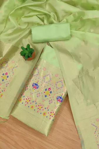 Pista floral woven banarasi silk dress material