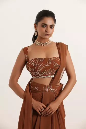 pre-stitched brown pre drpaed saree